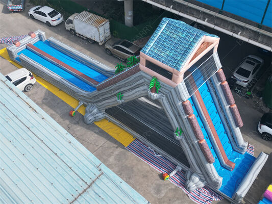 Cầu trượt nước bơm hơi khổng lồ loại thương mại, cầu trượt hai làn chủ đề nhiệt đới ướt/khô dành cho công viên giải trí & lễ hội